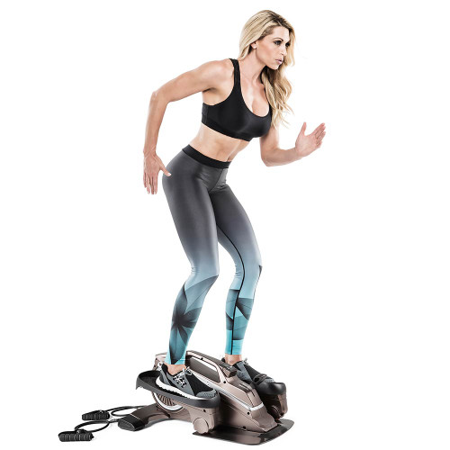 Bionic Body Compact Elliptical Trainer with Resistance Tubes in use by Kim Lyons while standing