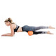 Bionic Body Massage Ball used by Kim Lyons to massage and rest hamstrings