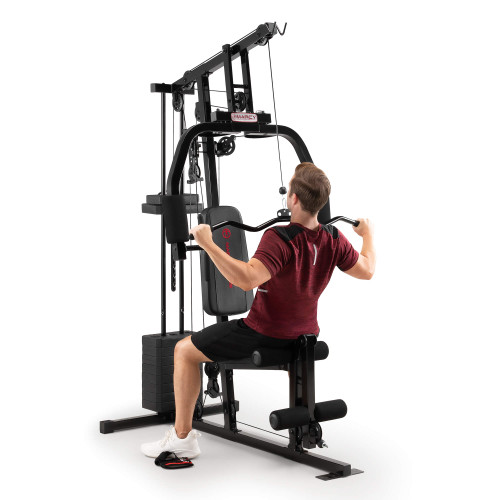 Marcy 100lb Stack Home Gym  MKM-81030 -  Male Model using Upper Pulley with Lat Bar for Lat Bar Pulldowns